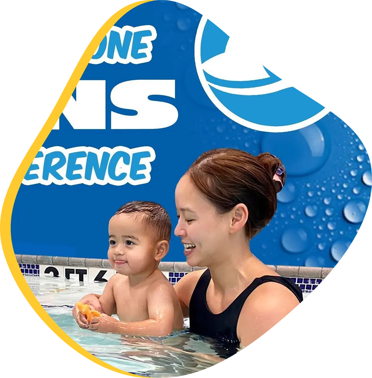 FINStructor guiding a swimmer during a private 1-on-1 swim lesson at FINS Swim School.