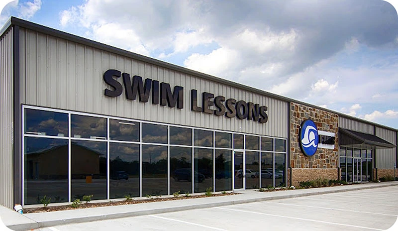 Photos of swim lessons and community events at FINS Swim School Cypress